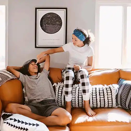 kids playing in front of custom star map from starrymaps.com